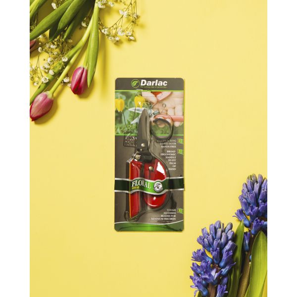Darlac floral shears packaging on a yellow background with flowers around